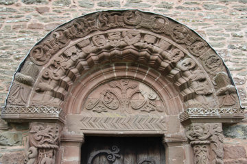 The ornate arch above the door into Kilpeck church*