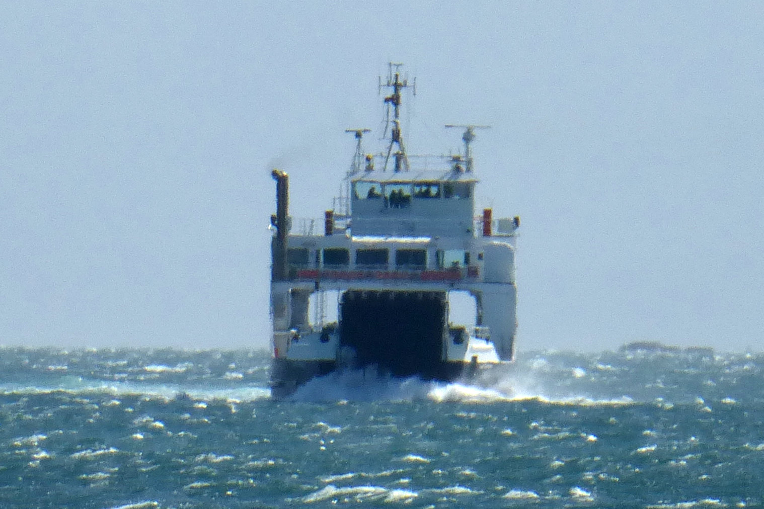 The modern ferry butts through a brisk sea between Harris and North Uist*