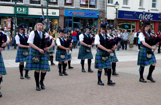 The Lochaber Pipes welcome visitors to Fort William