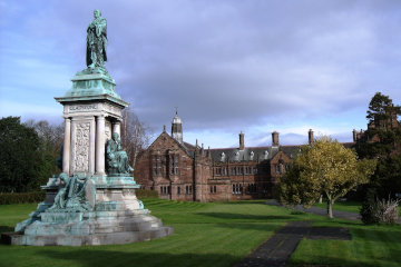 Gladstone stands outside his library in Hawarden